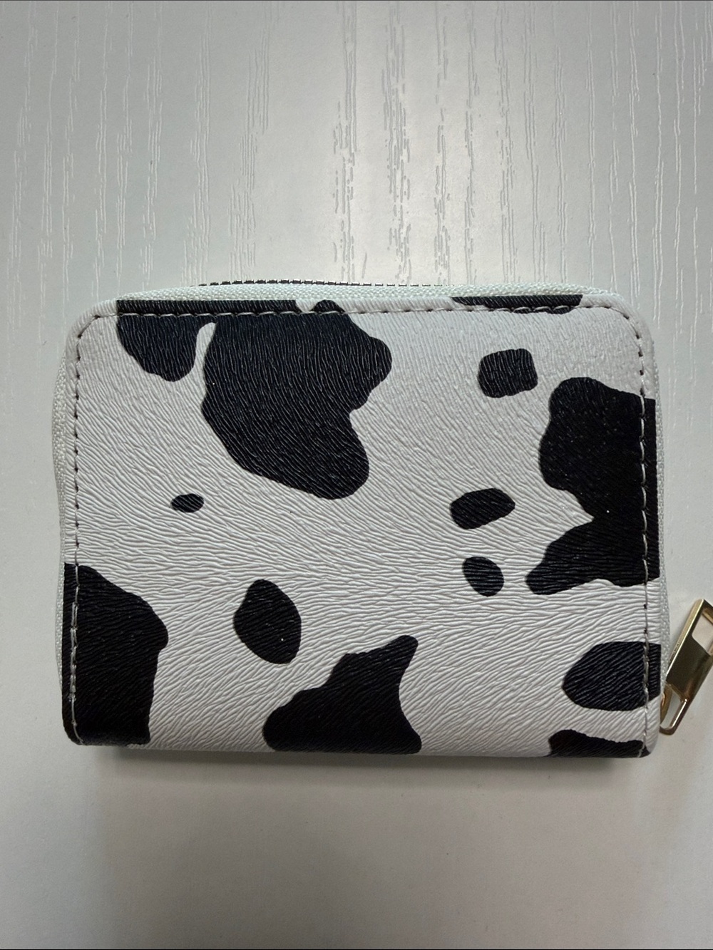 NWOT Cow Print Zip Wallet in Black and White